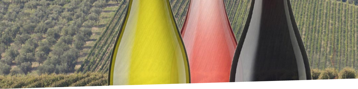 Secret Feasts at Peron No.4 Three bottles of Ilauri wine on a background of vineyards